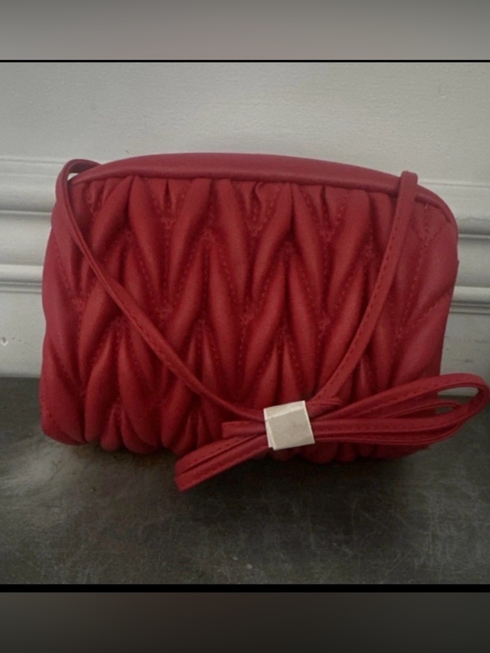 Red Quilted Crossbody Bag with Bow Accent